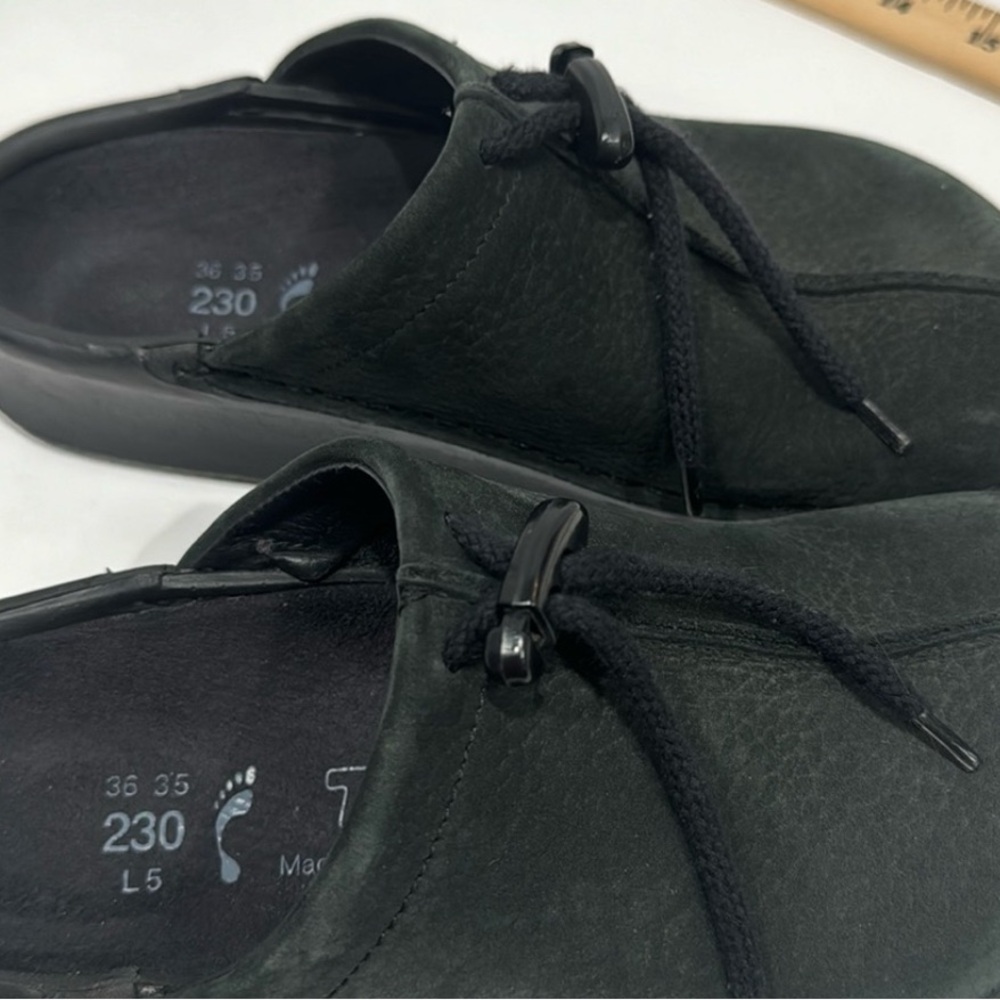 Women’s black suede slip ons. Great condition!